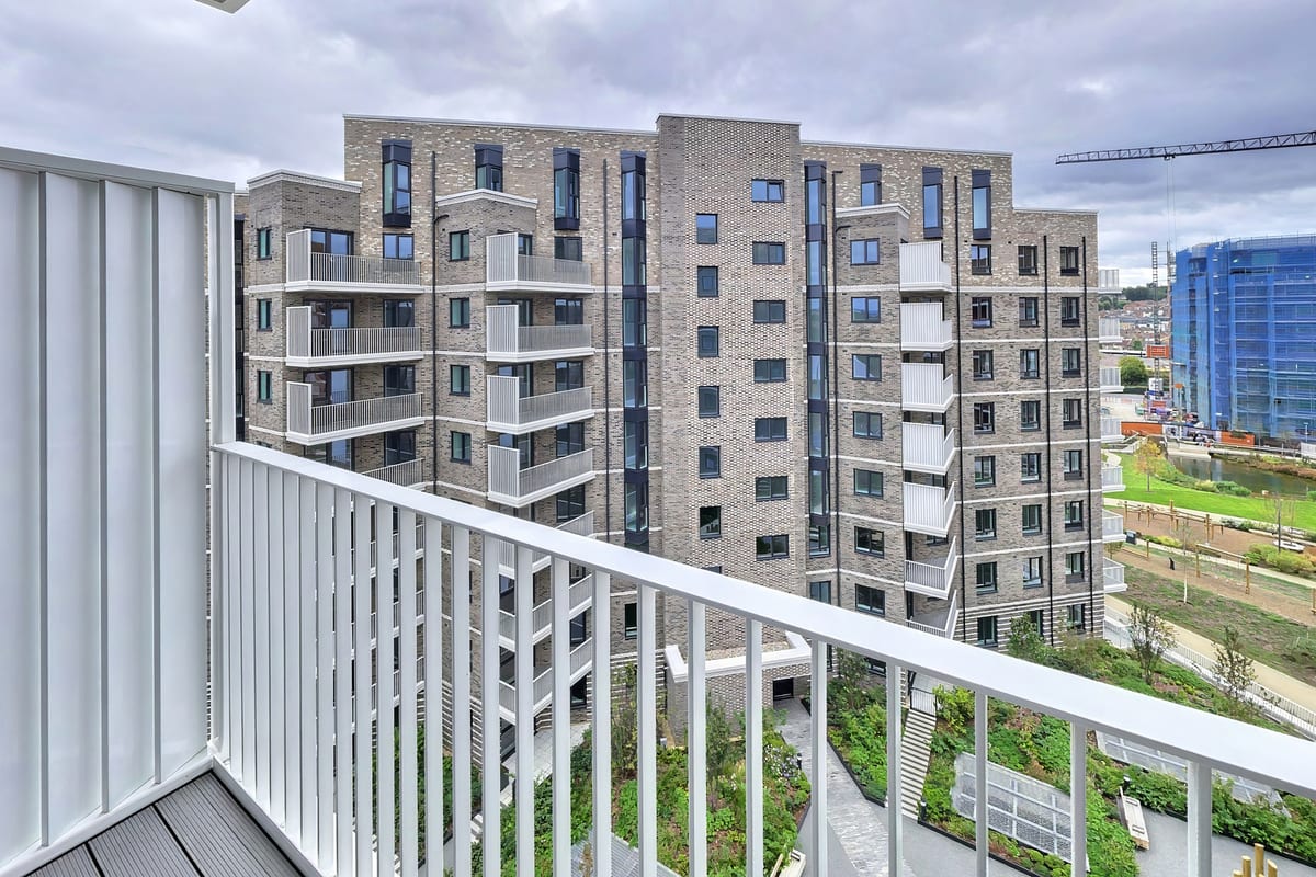 Balcony view down to the planted podium garden and across to the neighbouring building